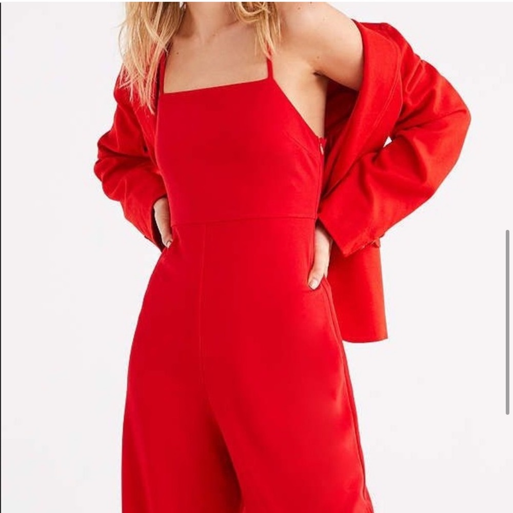 Urban outfitters red jumpsuit. Size small.